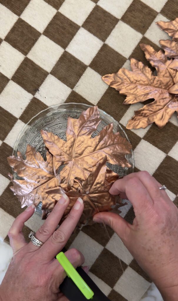 Placing copper leaves down