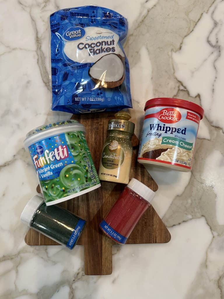 icing and ingredients for a charcuterie dessert board