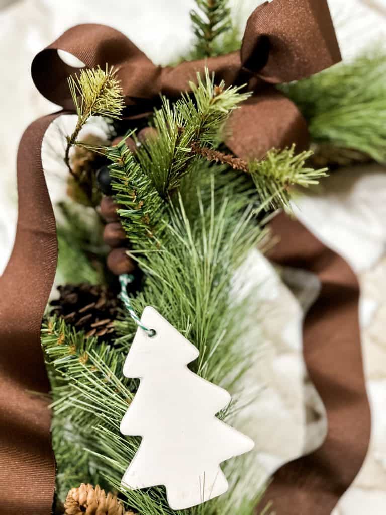 Brown gross grain bow on christmas wreath