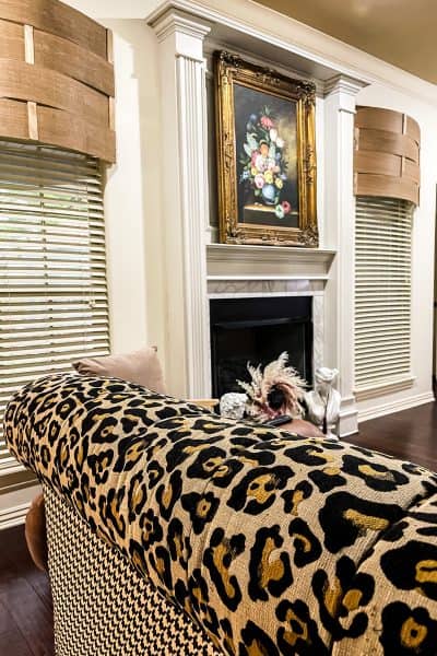 leopard print couch, oil painting, wooden valances