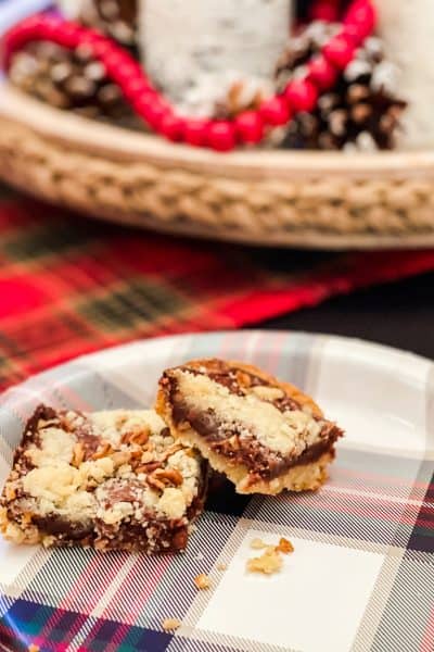 chocolate chip cookie bars on a plaid plate