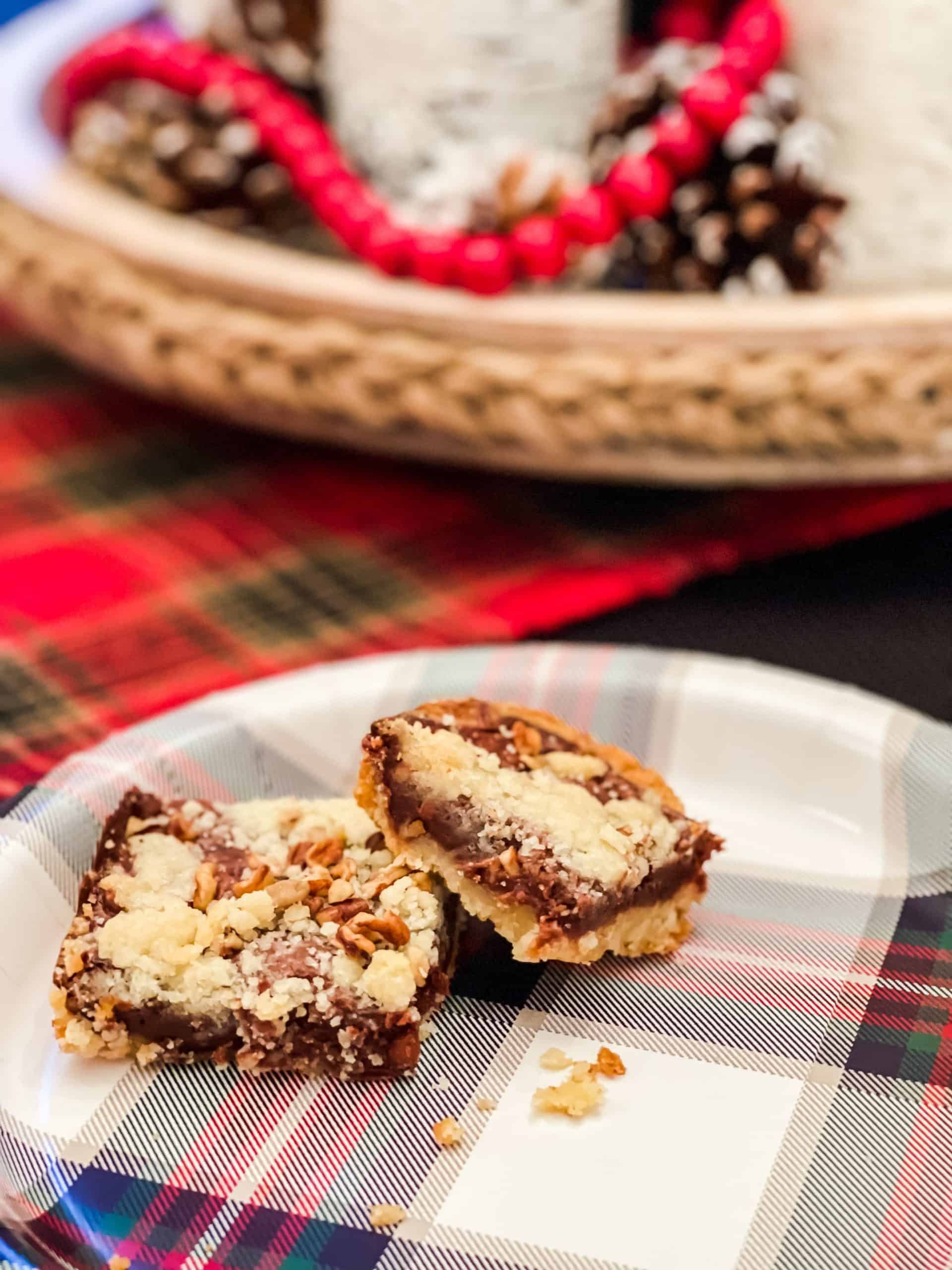 chocolate chip cookie bars on a plaid plate