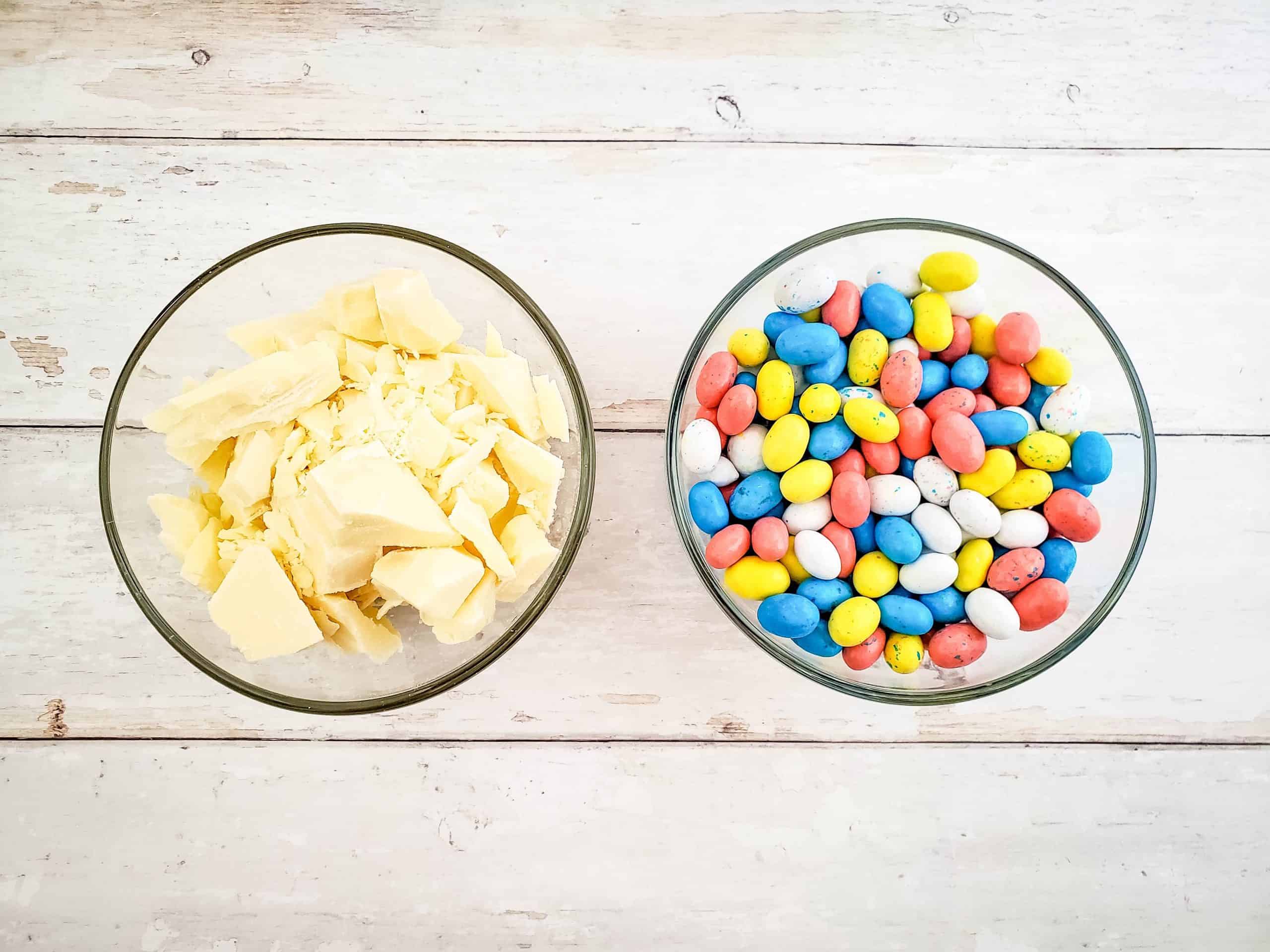 white chocolate cut into small pieces and robin's egg easter candies in two bowls